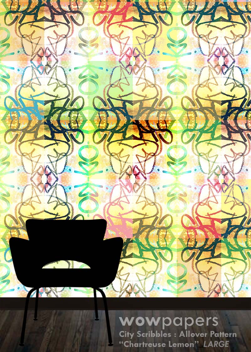A colorful allover patterned wallpaper or wall mural shown in a room mockup, featuring a black chair silhouette at the bottom and a wood floor. The pattern contains overlapping script and floral-like motifs in yellow, green, blue, pink, and orange on a light background.