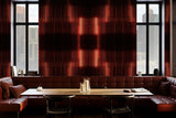 Modern restaurant interior with a huge wallpaper mural, a long wooden table and leather booths with midtown manhattan views