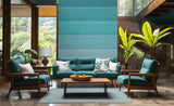 tropical hotel interior with midcentury furniture and large custom wallpaper mural