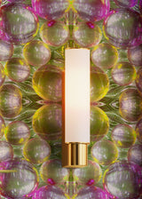 Decorative wall sconce with a colorful, abstract wallpaper pattern in the background